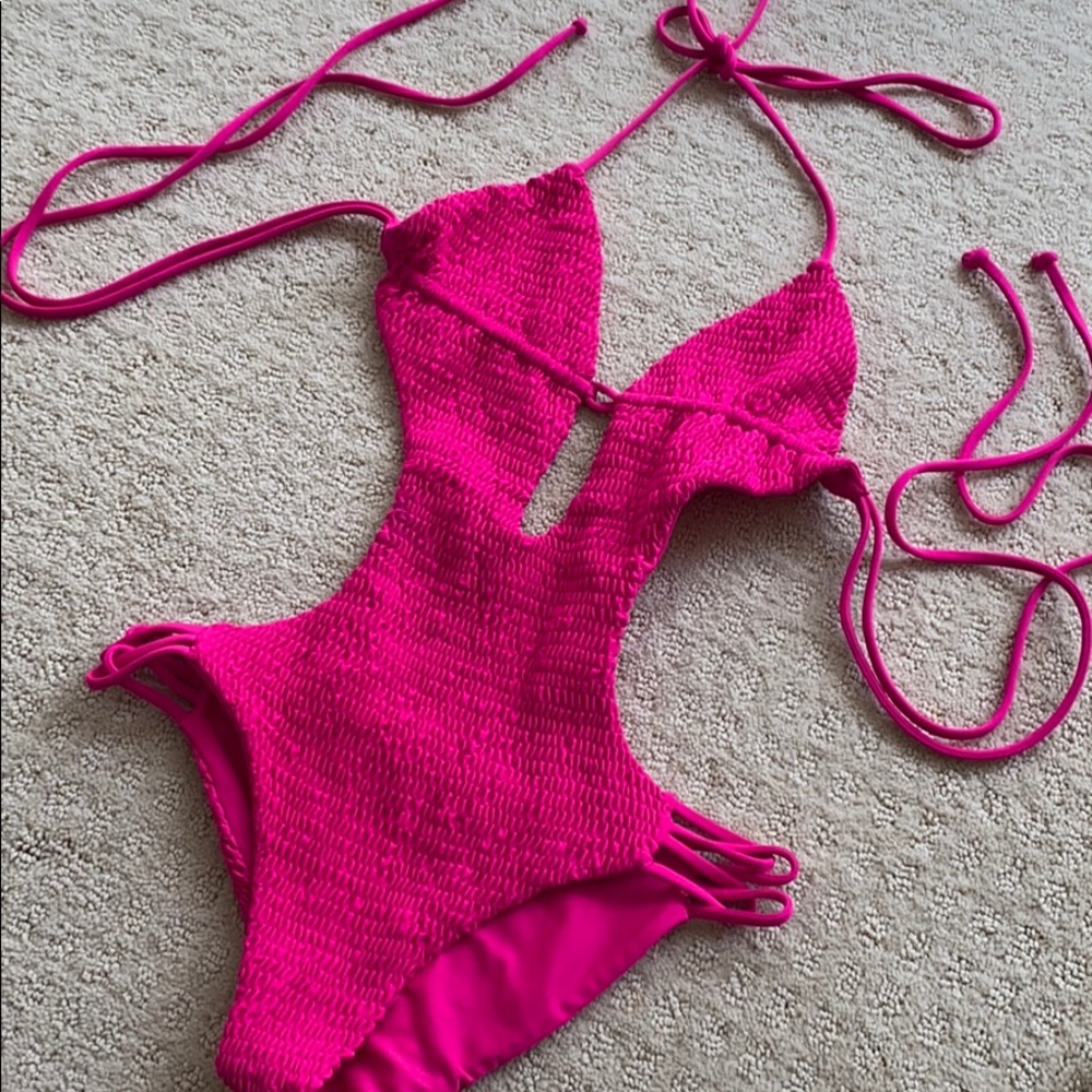 Hot pink one piece swimsuit.